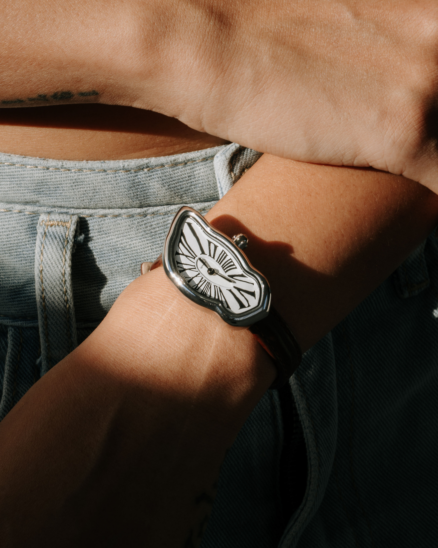 Montre fondante petit argent