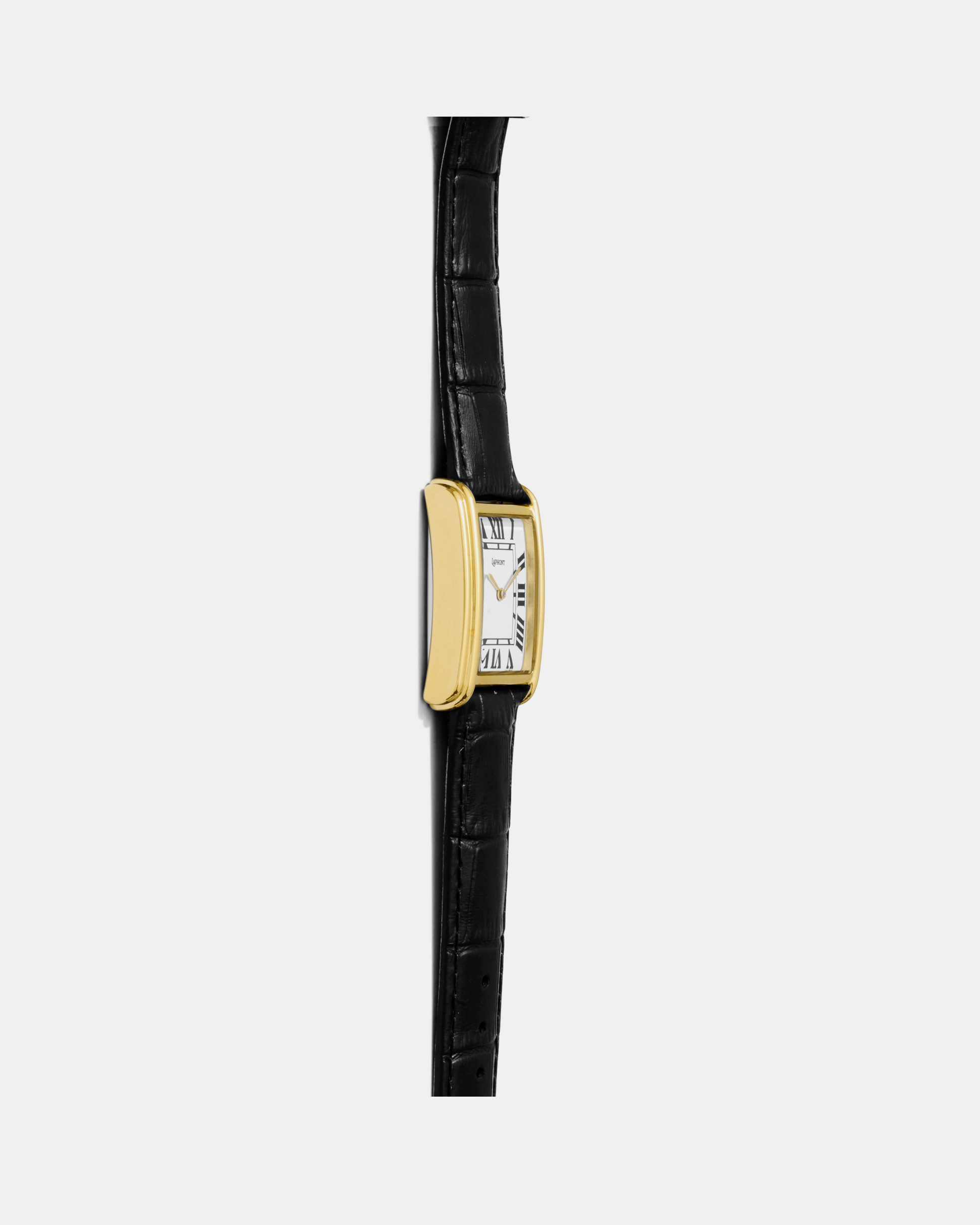 Bloc gold square watch, left-side profile showing the stepped case and lugs