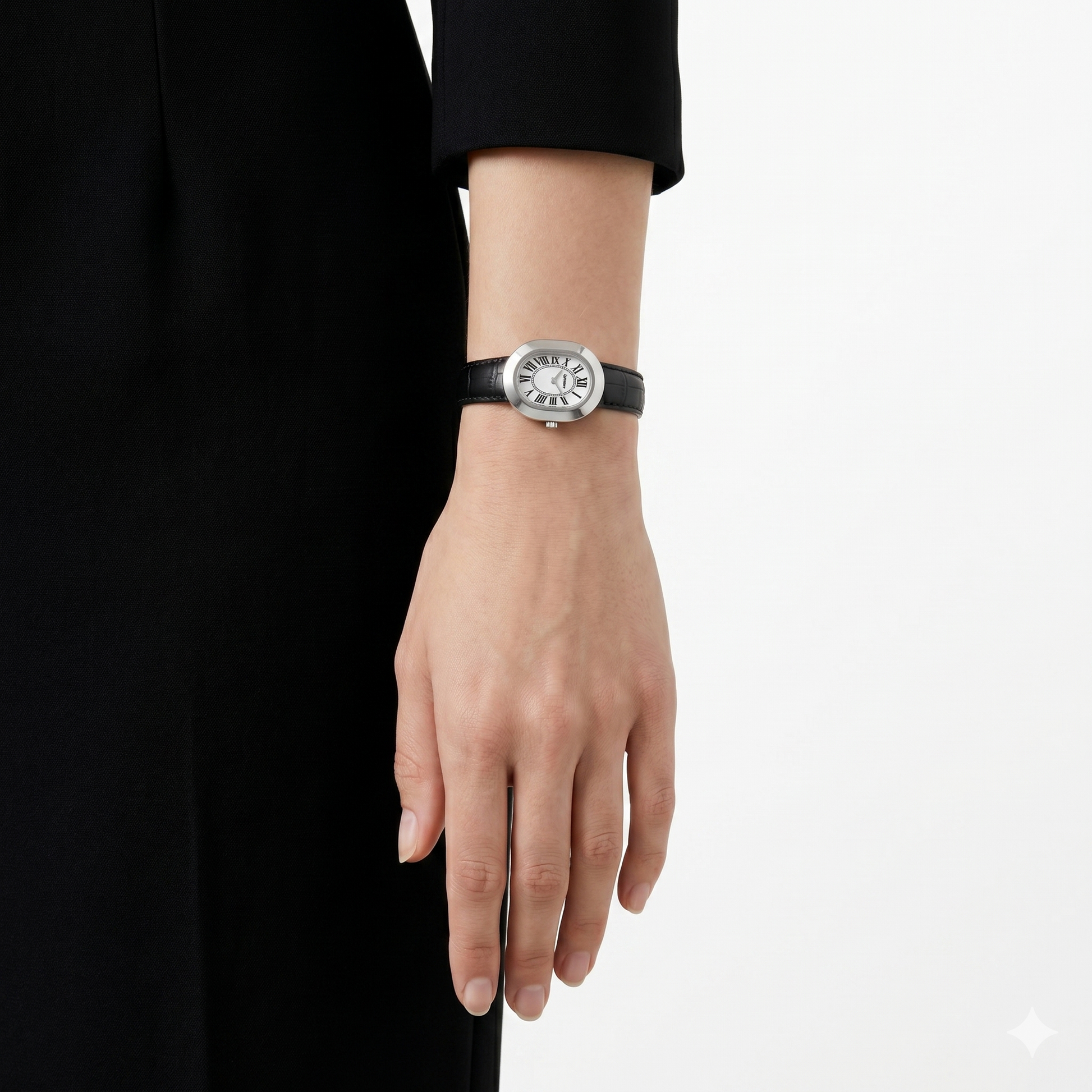 Oule oval silver dress watch with white Roman-numeral dial on black leather strap on wrist